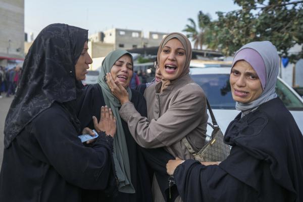Palestinian women mourn victims of Israeli bombardment of Al-Aqsa Martyrs Hospital, Gaza Strip, December 8, 2024.