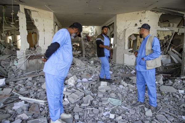 Medics inspect ruins of Al Najjar hospital from Israeli airstrike