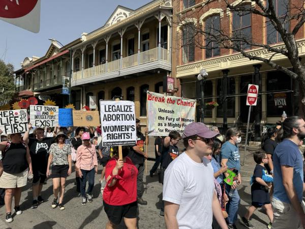 International Women's Day protest in Texas near the Alamo.