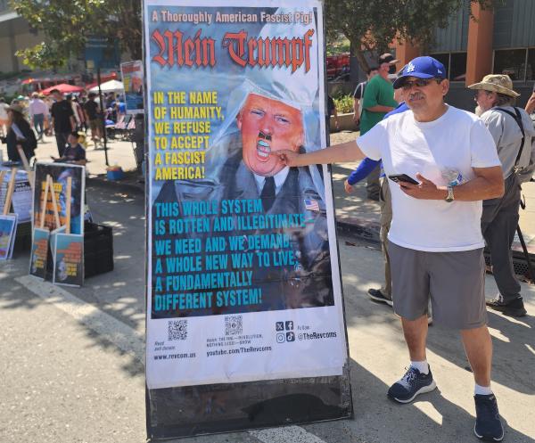 The Revcom Corps LA table at Bernie Sanders rally.