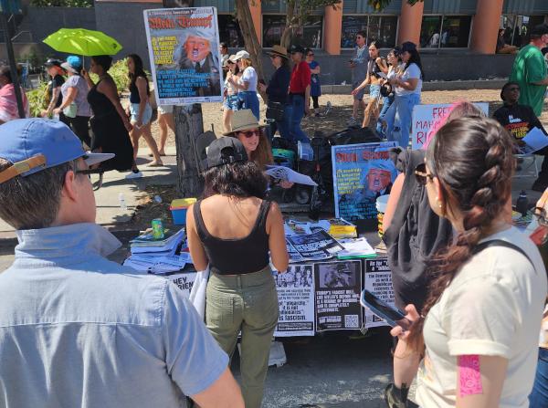 The Revcom Corps LA table at Bernie Sanders rally.
