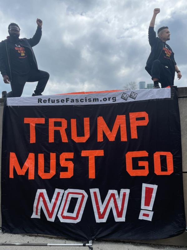 Noche Diaz and Leo Pardo with banner Trump Must Go NOW!, Chicago