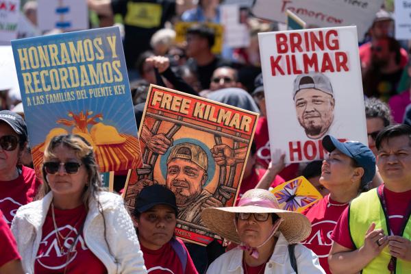 May Day protesters with signs Bring Kilmar Home, en route to White House.
