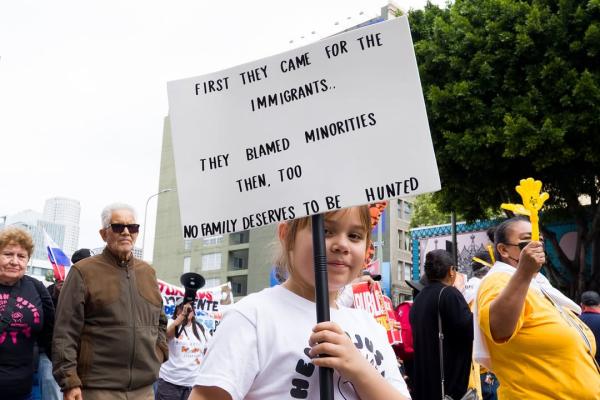 Young girl in May Day march Los Angeles. "First they came for the immigrants..." 