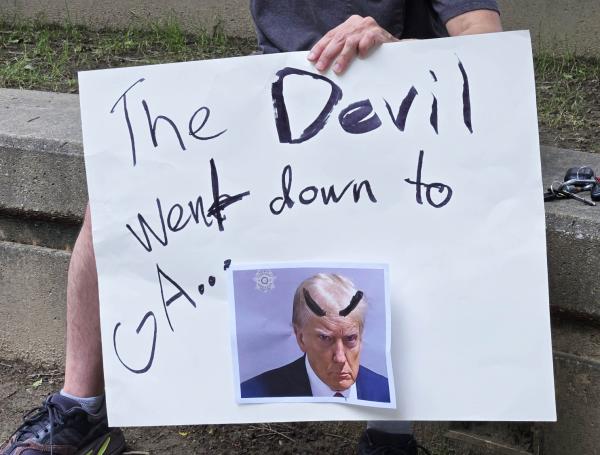 May 17 Refuse Fascism protest in Atlanta. Poster: The Devil came down to Georgia...