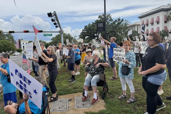 People in Tallahassee, Florida protest arrest of immigrants, May 30, 2025.