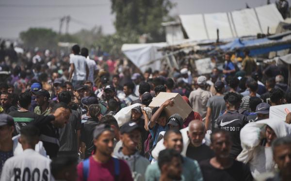 Palestinians coming from food distribution site in Rafah.