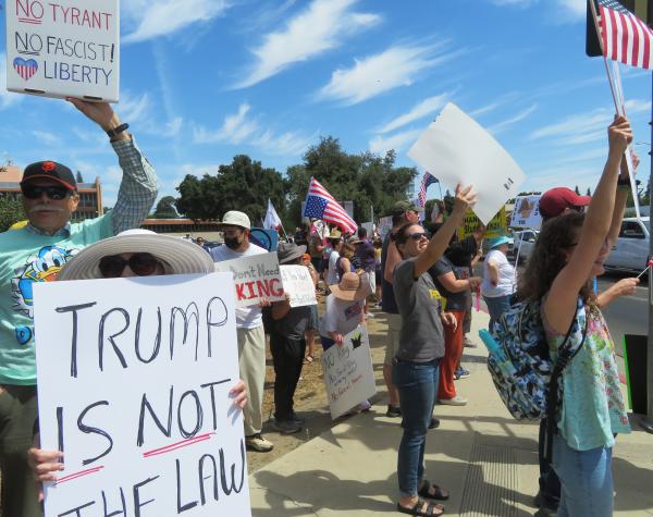 Visalia, California, people line the streets on No Kings Day, June 14, 2025.