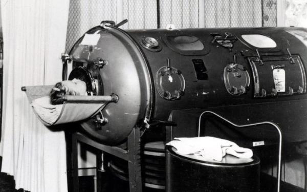 a polio-stricken girl in an iron lung