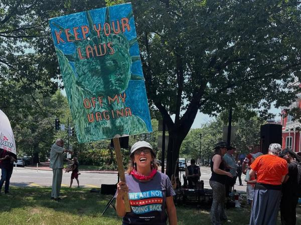 Sign at Refuse Fascism march in Washington DC: Keep Your Laws Off My Vagina.