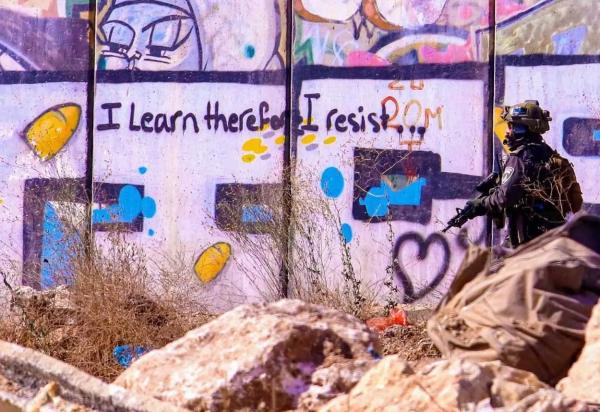 Chritian Rizzi photograph of graffiti on Palestinian wall