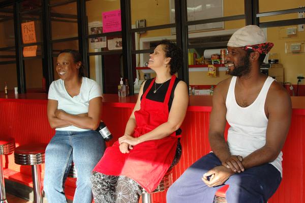 Hurricane Katrina survivors help each other, September 1, 2005.