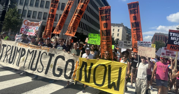 Refuse Fascism banner leads march in Washington DC, August 16, 2025.