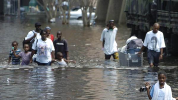People wading after Hurricane Katrina