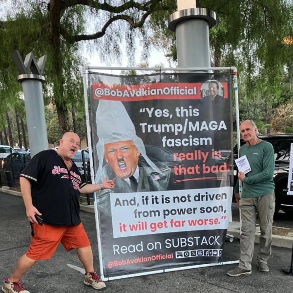 Bob Avakian poster at Neil Young concert, Hollywood Bowl, Los Angeles