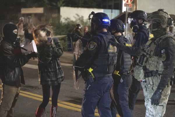 Portland DHS pepper spray protester at ICE facility, October 2, 2025.