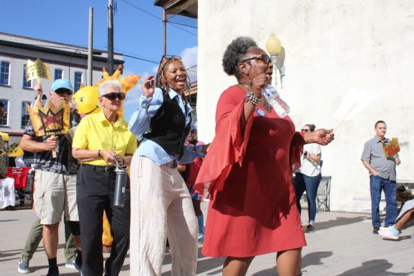 Protesters dancing on No Kings day at the foot of the Edmund Pettus Bridge in Selma, Alabama