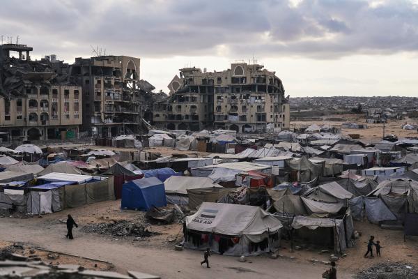 A tent camp for displaced Palestinians next to destroyed homes in Khan Younis, Gaza Strip, October 18, 2025.