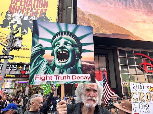 New York City, sign: Fight Truth Decay, October 18, 2025.