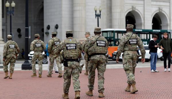 National Guard soldiers patrol at Union Station, October 28, 2025, in Washington.