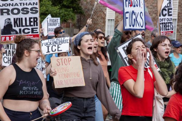 4 young women chanting in ICE Out protest in New Orleans