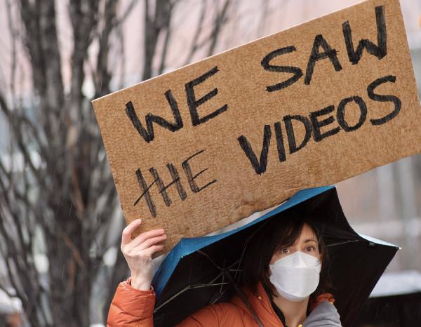 Sign at protest in Philadelphia: We Saw the Videos