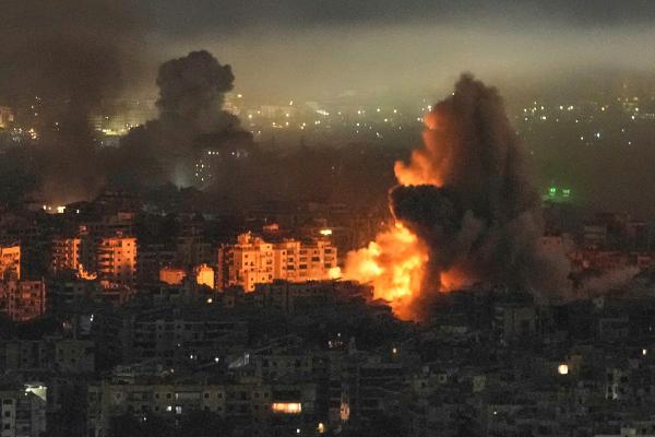 Smoke and flames rise from an Israeli airstrike in Dahiyeh, Beirut, Lebanon, March 11, 2026.
