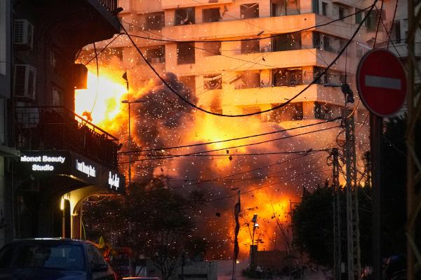 Building in Lebanon explodes from an Israeli strike in central Beirut, Lebanon, March 18, 2026.