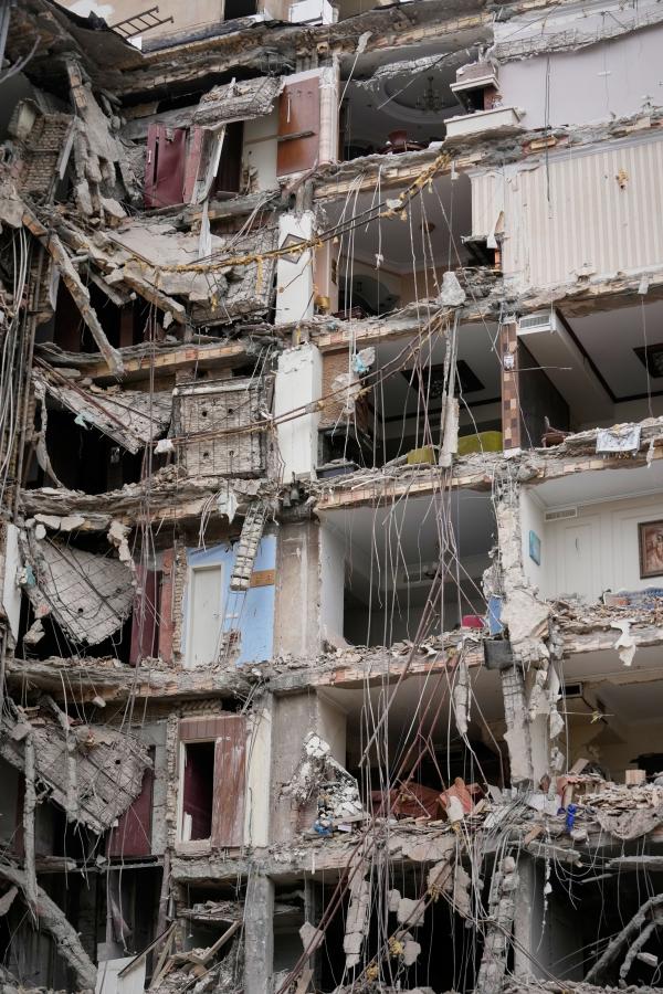 a residential building damaged in an earlier U.S.-Israeli strike is seen in Tehran, Iran,