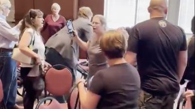 Chaotic school board meeting in Loudon County, Virginia.