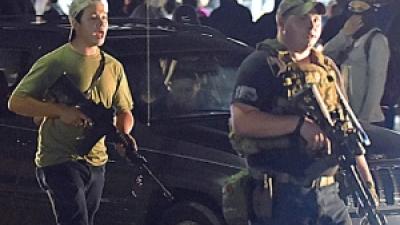 Rittenhouse with gun at protest