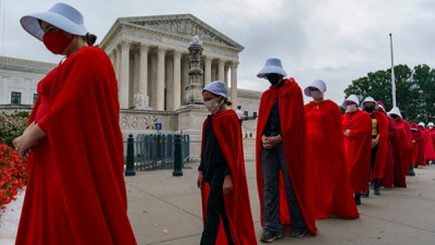 Protesters in Handmaids costumes outside the Supreme Court