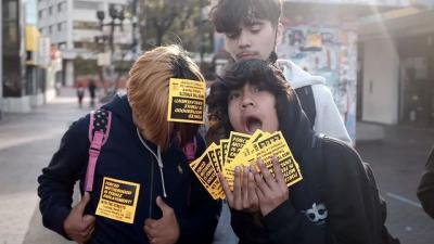 Skater kids take Forced Motherhood is Female Enslavement stickers to put up everywhere