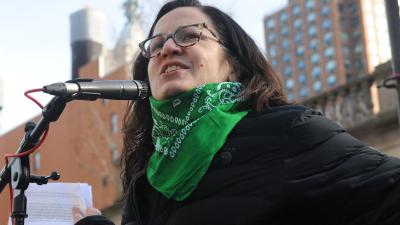 Sunsara Taylor speaking at NYC International Women's Day rally.