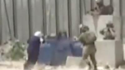 Palestinian woman being shot by Israeli soldiers