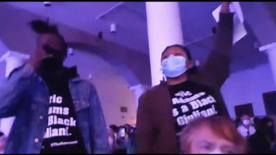 Protesters with shirts saying Eric Williams is a Black Giuliani