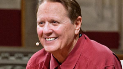 Bob Avakian in red shirt