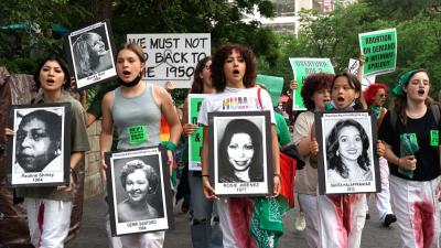 New York City RU4AR students hold signs of victims at Union Square.