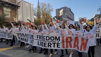 Montreal lead banner—Freedom for Iran—in march for Iran, October 22, 2022