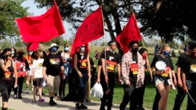 Revcoms marching