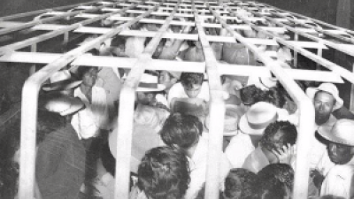 Border Patrol packed Mexican immigrants into trucks, then transported them to the border for deportation, June 1954.