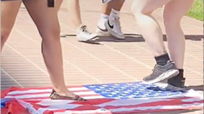 Revcoms challenged students to step on the the American flag, at University of Southern California, April 22.