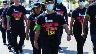 Revolution Club marching in streets of Los Angeles