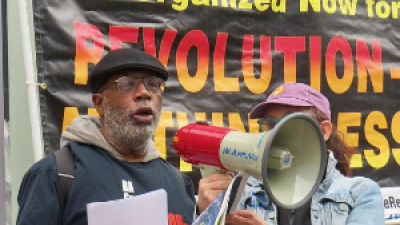 Carl Dix speaks to people in SoHo, New York City, protesting the murder of Jordan Neely.