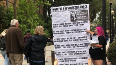 Revcoms on the UCLA campus building for Sunsara’s talk: “Woke” Lunacy Vs. Real Revolution.