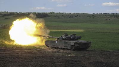 A Ukrainian tank fires in Chasiv Yar, the site of fierce battles with the Russian forces, June 7, 2023.
