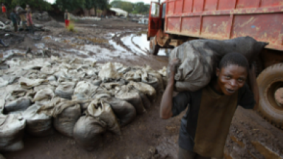 Child laborer in coltan mine