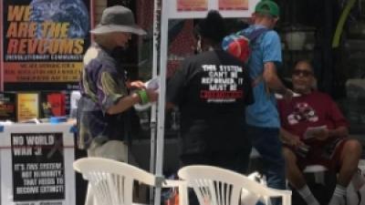 People congregating at a street fundraising event
