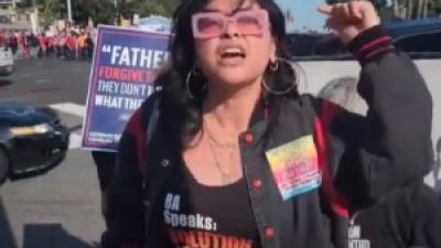 Young woman revcom counter-protesting anti-gay protest