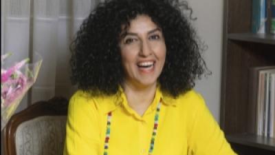 Narges Mohammadi in yellow sweater